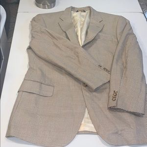 A lightly used sports coat. T. Harris of London.